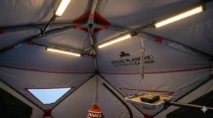 The communal "social" scene with three anglers around the table.