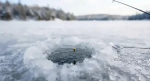 Canadian ice fishing gear layout featuring reels, jigs, and spool of fluorocarbon ice fishing line.
