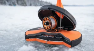 Detailed view of the windproof cover and smooth spool mechanism on a modern thermal tip-up.