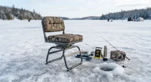 A high-performance swivel ice fishing seat set up on a frozen Canadian lake during peak hardwater season.